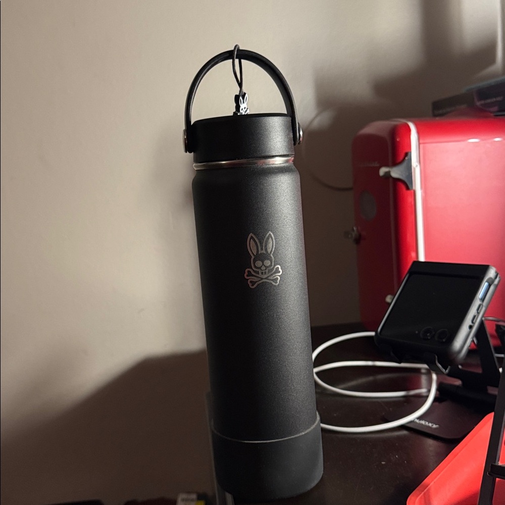Psycho Bunny Water Bottle. Stainless steel matte black bottle. Screw on lid. NWT